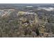 Expansive aerial view of a community featuring mature trees, a school, and single Gathering homes at 120 Banks Ridge Rd, Fort Mill, SC 29715