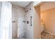 Bathroom with shower, grab bars and tile surround at 1295 Reservation Rd, Rock Hill, SC 29730
