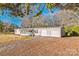 Front view of ranch home with screened porch and garage at 1295 Reservation Rd, Rock Hill, SC 29730