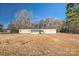 Ranch home with screened porch, detached garage, and large yard at 1295 Reservation Rd, Rock Hill, SC 29730