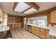 Bright kitchen with wood cabinets, tile backsplash, and stainless steel appliances at 1295 Reservation Rd, Rock Hill, SC 29730