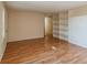 Spacious living room with hardwood floors and built-in shelving at 1295 Reservation Rd, Rock Hill, SC 29730