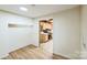 Spacious spare bedroom with hardwood floors and access to kitchen at 1295 Reservation Rd, Rock Hill, SC 29730