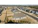 Aerial view of the home with a fenced backyard, and a view of the neighborhood at 1503 Ainslie Place Rd, Indian Trail, NC 28079