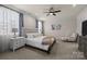 Serene main bedroom showcasing a large bed, elegant nightstands, and soft, natural light at 1503 Ainslie Place Rd, Indian Trail, NC 28079