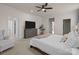 Spacious main bedroom with lots of natural light, ceiling fan, and a relaxing atmosphere at 1503 Ainslie Place Rd, Indian Trail, NC 28079