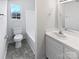 Clean bathroom with white vanity, toilet, and bathtub at 153 Pattys Pl, Stony Point, NC 28678