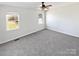 Spacious bedroom with neutral walls and carpet flooring at 153 Pattys Pl, Stony Point, NC 28678
