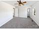 Main bedroom with ceiling fan, ensuite bathroom access at 153 Pattys Pl, Stony Point, NC 28678