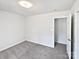 Bright bedroom with grey carpet and a closet at 153 Pattys Pl, Stony Point, NC 28678