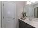 Bathroom features a sink with fresh flowers, modern fixtures, and vanity at 159 W Warfield Dr, Mooresville, NC 28115