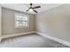 Simple bedroom with window and ceiling fan at 170 Sherwood Cir, Rock Hill, SC 29730