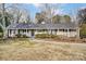 Charming ranch house with mature trees and manicured lawn at 170 Sherwood Cir, Rock Hill, SC 29730