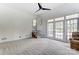 Gathering room with gray carpet, ceiling fan and sliding glass doors at 170 Sherwood Cir, Rock Hill, SC 29730