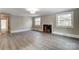 Living room with hardwood floors, fireplace and large windows at 170 Sherwood Cir, Rock Hill, SC 29730