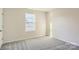 Bright bedroom with carpeted floor and large window at 1713 Wooten Way, Bessemer City, NC 28016