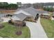 Aerial view of a well-maintained property with manicured landscaping and brick architecture at 2008 Surefire Ct, Denver, NC 28037