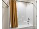 Bathroom featuring a bathtub with a shower curtain, and a shower head at 2008 Surefire Ct, Denver, NC 28037
