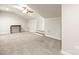 Spacious bonus room with neutral carpet, table, and versatile design at 2008 Surefire Ct, Denver, NC 28037
