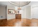 Elegant dining area with hardwood floors, chandelier, and ample space for gatherings at 2008 Surefire Ct, Denver, NC 28037