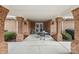 Inviting entrance with brick columns, seating area, and glass doors at 2008 Surefire Ct, Denver, NC 28037