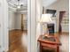 Open concept, with hardwood floors, fireplace, and large window at 2008 Surefire Ct, Denver, NC 28037