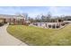 Expansive pool area featuring a pool, lounge chairs, and lush landscaping at 2008 Surefire Ct, Denver, NC 28037