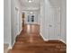 Hardwood floors and neutral-toned walls in the foyer at 2507 Oakdale Creek Ln, Charlotte, NC 28216