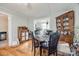Comfortable dining area with hardwood floors, classic decor, and views to kitchen at 30 Hunter St, York, SC 29745
