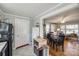An open kitchen adjacent to the dining and living room with gray walls and tile floors at 30 Hunter St, York, SC 29745