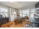 Cozy sun room featuring natural light, hardwood floors and relaxed seating at 30 Hunter St, York, SC 29745