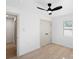 Bedroom with ceiling fan and closet at 3020 Bellaire Dr, Charlotte, NC 28216