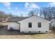 Side view of charming house with white siding at 3020 Bellaire Dr, Charlotte, NC 28216