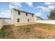 Large backyard with a patio, fenced perimeter, and partial grass coverage at 310 Black Rock School Rd, Cherryville, NC 28021