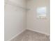 Walk in closet with carpet and wire shelving at 310 Black Rock School Rd, Cherryville, NC 28021