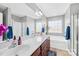 Spacious bathroom with a double sink vanity, large mirror, soaking tub, and a separate glass-enclosed shower at 425 Webb Rd, Shelby, NC 28152