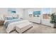 Bright bedroom featuring a comfortable bed, stylish decor, and ample natural light from two windows at 425 Webb Rd, Shelby, NC 28152