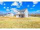Charming two-story home with vinyl siding, attached garage, and landscaped yard under a sunny sky at 425 Webb Rd, Shelby, NC 28152