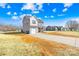 Two-story home featuring a spacious driveway, attached garage, and well-maintained lawn at 425 Webb Rd, Shelby, NC 28152