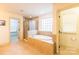 Bright bathroom with a tiled shower and separate soaking tub at 712 Kenway Loop, Mooresville, NC 28117