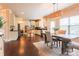 Bright kitchen flowing into dining area and spacious living space with lots of natural light at 712 Kenway Loop, Mooresville, NC 28117