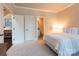 Comfortable main bedroom with carpet and an ensuite bath at 712 Kenway Loop, Mooresville, NC 28117