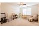 Bright playroom has a neutral carpet, a ceiling fan, and lots of space to enjoy at 712 Kenway Loop, Mooresville, NC 28117