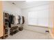 Walk-in closet with ample shelving and hanging space at 712 Kenway Loop, Mooresville, NC 28117