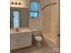 Bright and airy bathroom featuring a tub and a vanity sink at 765 N Alexander St, Charlotte, NC 28202