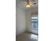 A bright bedroom with a ceiling fan and a window at 765 N Alexander St, Charlotte, NC 28202