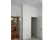 Hallway featuring a view into the bathroom and the closet at 765 N Alexander St, Charlotte, NC 28202