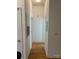 Neutral hallway with hardwood floors at 765 N Alexander St, Charlotte, NC 28202