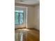 Living room features hardwood floors and natural light from the windows at 765 N Alexander St, Charlotte, NC 28202