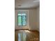 A view of the hardwood floors and natural light from the windows at 765 N Alexander St, Charlotte, NC 28202